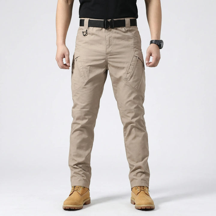 Men's hiking cargo pants with 9 multi-pockets, durable, quick-dry, designed for rugged outdoor adventures.