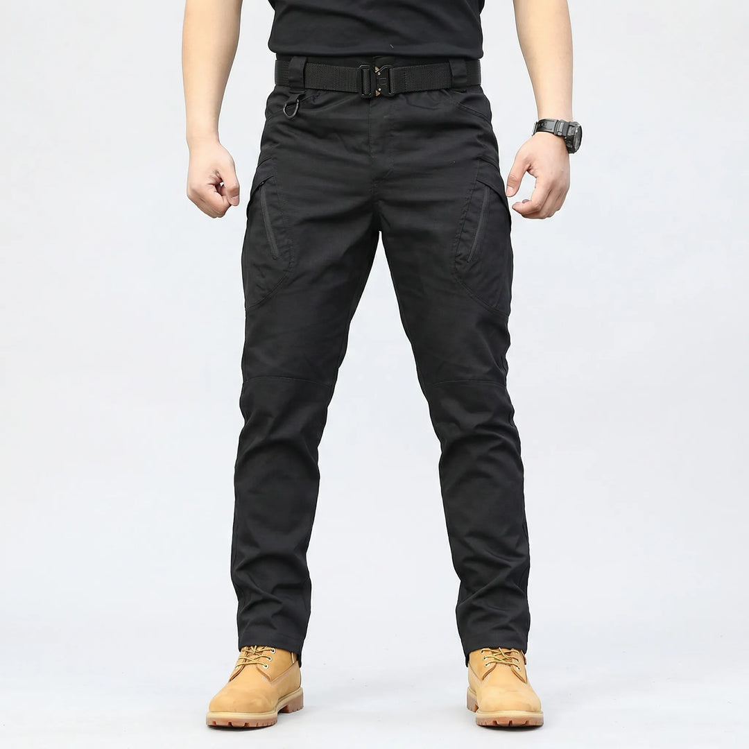 Versatile men's utility cargo pants, comfortable stretch fit, 9 pockets, quick-dry for any outdoor activity.