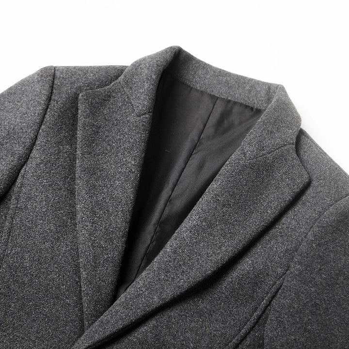 Long men's tailored trench coat, ideal for smart casual and business attire. A versatile fall/winter overcoat.