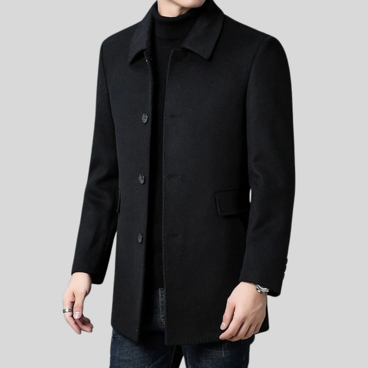 Sleek men's tailored overcoat in charcoal grey, ideal for formal wear, cold weather, and business.