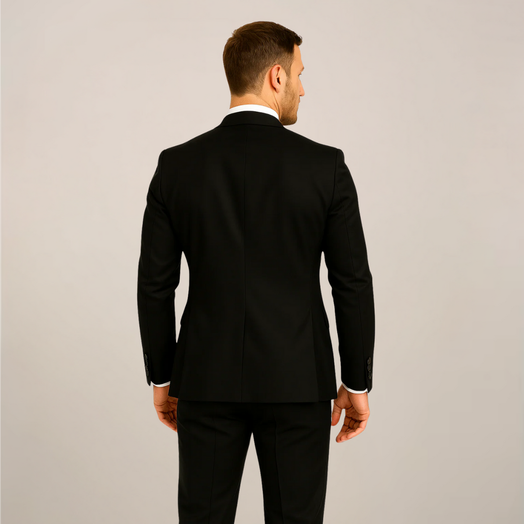 Sharp men's formal wear: tailored three-piece suit with a modern contrast lapel for event fashion.