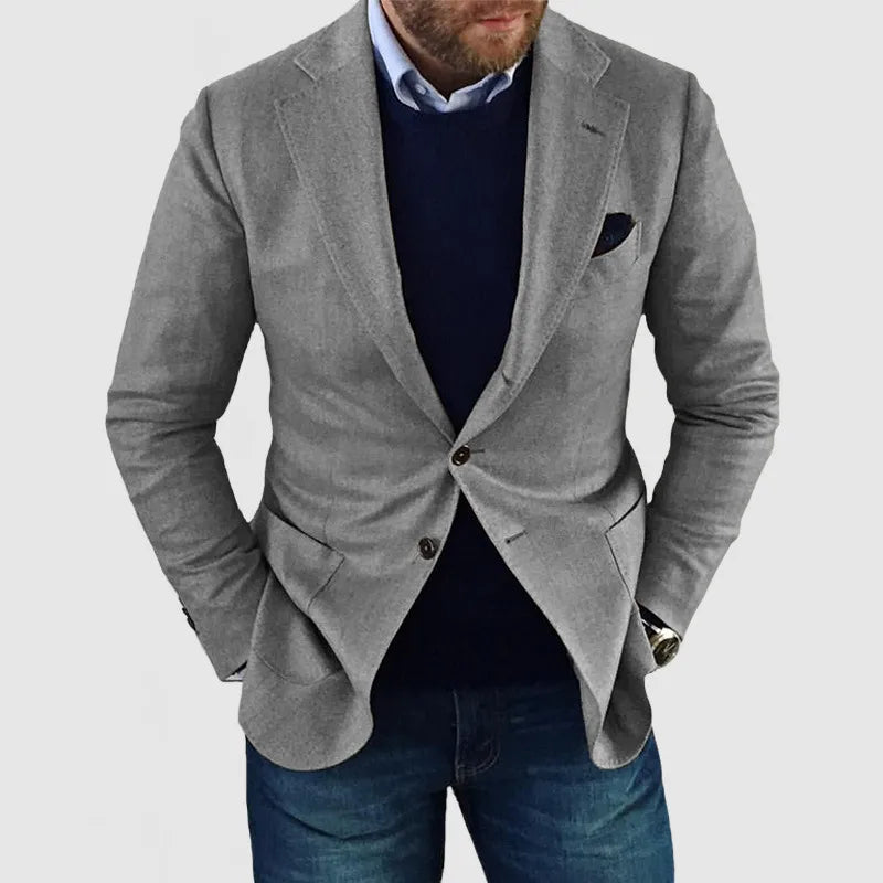 Classic men's two-button blazer, tailored for a sharp look. Essential smart casual and formal event jacket.