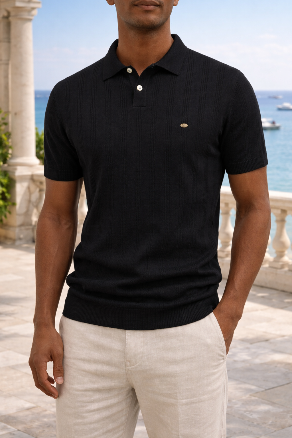 Close-up of a men's comfortable textured knit polo shirt with a stylish collared design & button placket.