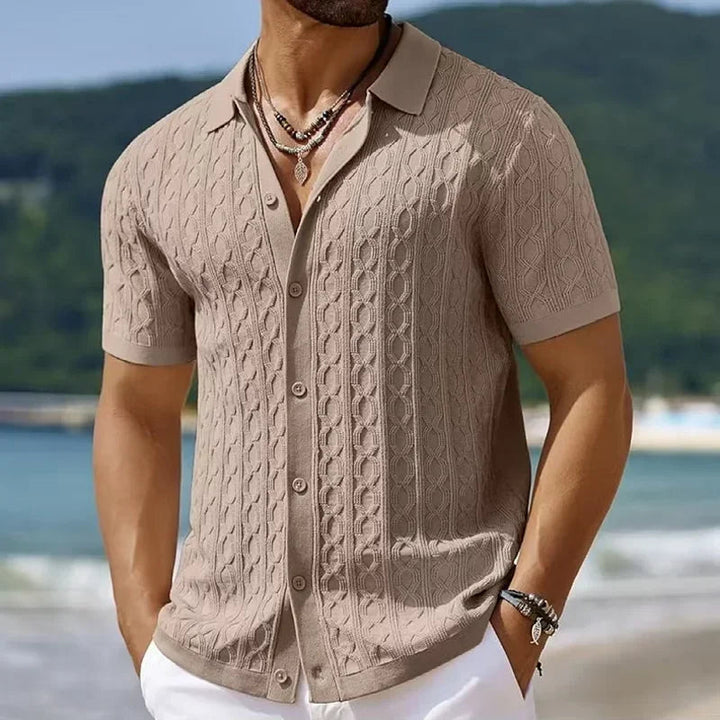 Stylish men's knit polo shirt, a textured short-sleeve top ideal for smart-casual summer outfits and everyday wear.