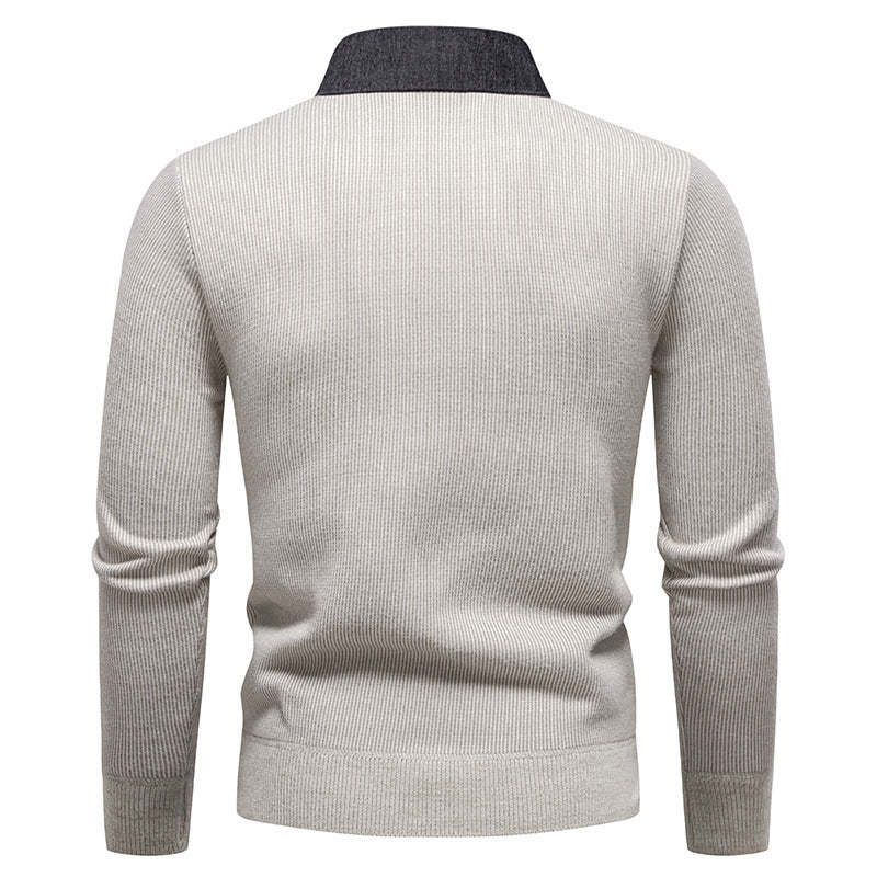 Detail shot: Men's textured knit sweater showcasing the unique layered collar design. Elegant, smart casual winter fashion.