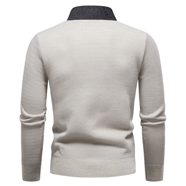 Detail shot: Men's textured knit sweater showcasing the unique layered collar design. Elegant, smart casual winter fashion.