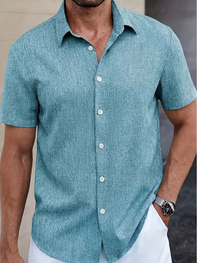 Stylish men's textured polo shirt with point collar, regular fit. Perfect versatile top for men's casual style.