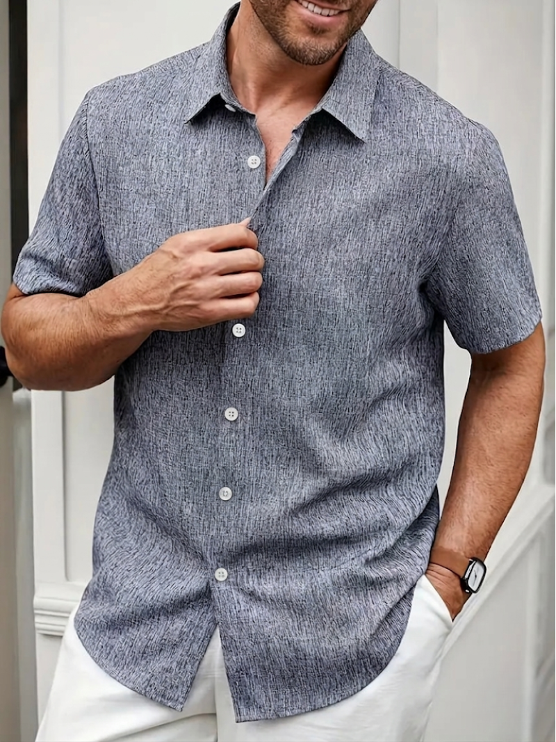 Regular fit men's polo shirt with subtle texture, short sleeves, and button-down front. Great for summer fashion.