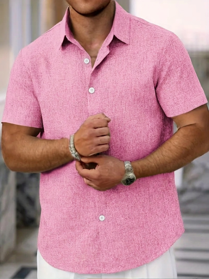 Close-up of a men's textured polo shirt in a regular fit, with button-down placket. Casual and stylish men's wear.