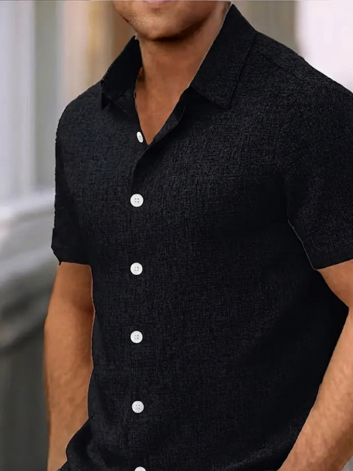 Fashionable men's regular fit textured polo shirt, short sleeve, and button-down. A perfect addition to men's style.