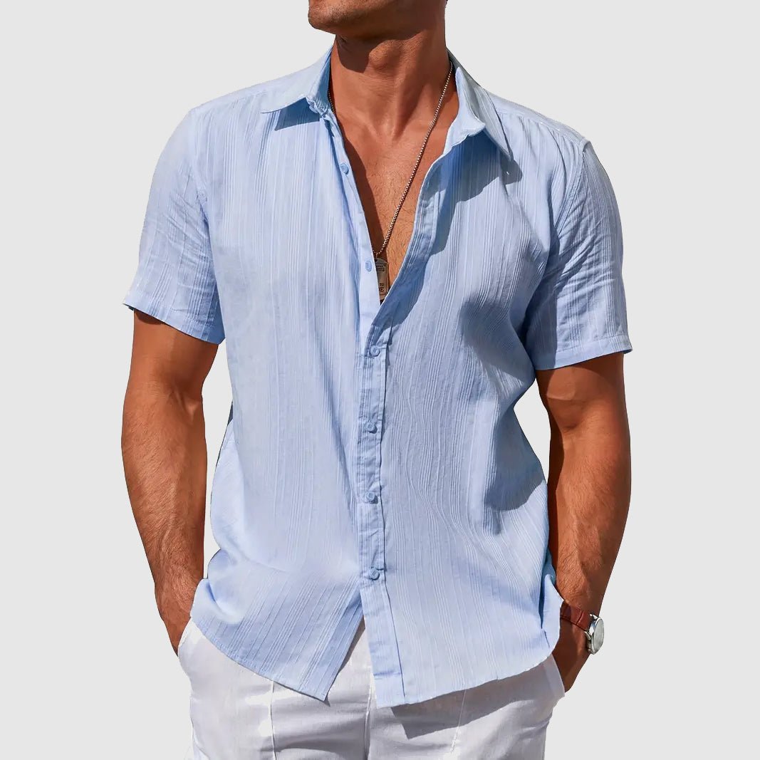 Men's textured short sleeve top for warm weather. Lightweight comfort wear, ideal for everyday casual summer style.