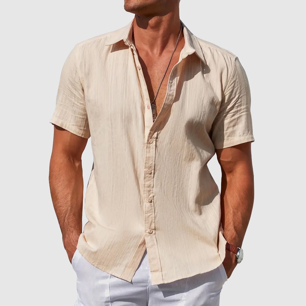 Stylish men's textured button-front shirt. Short sleeve casual top, perfect for summer and everyday warm weather comfort.