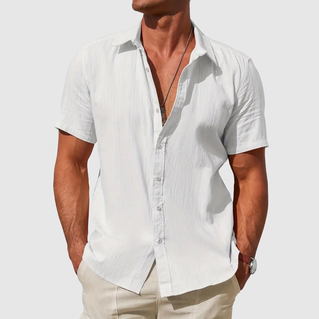 Regular fit men's textured short sleeve top. Lightweight comfort wear, great for summer casual style and warm weather.