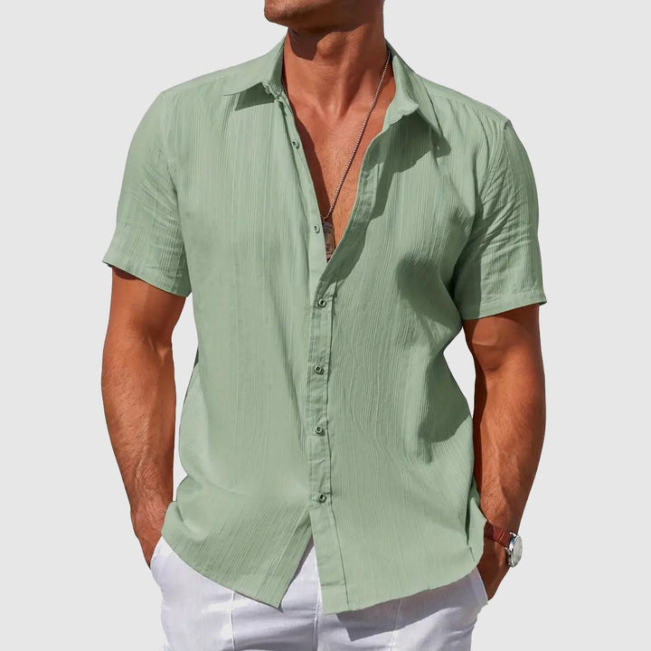 Warm weather men's textured short sleeve shirt. Lightweight, comfortable, and stylish for summer casual wear.