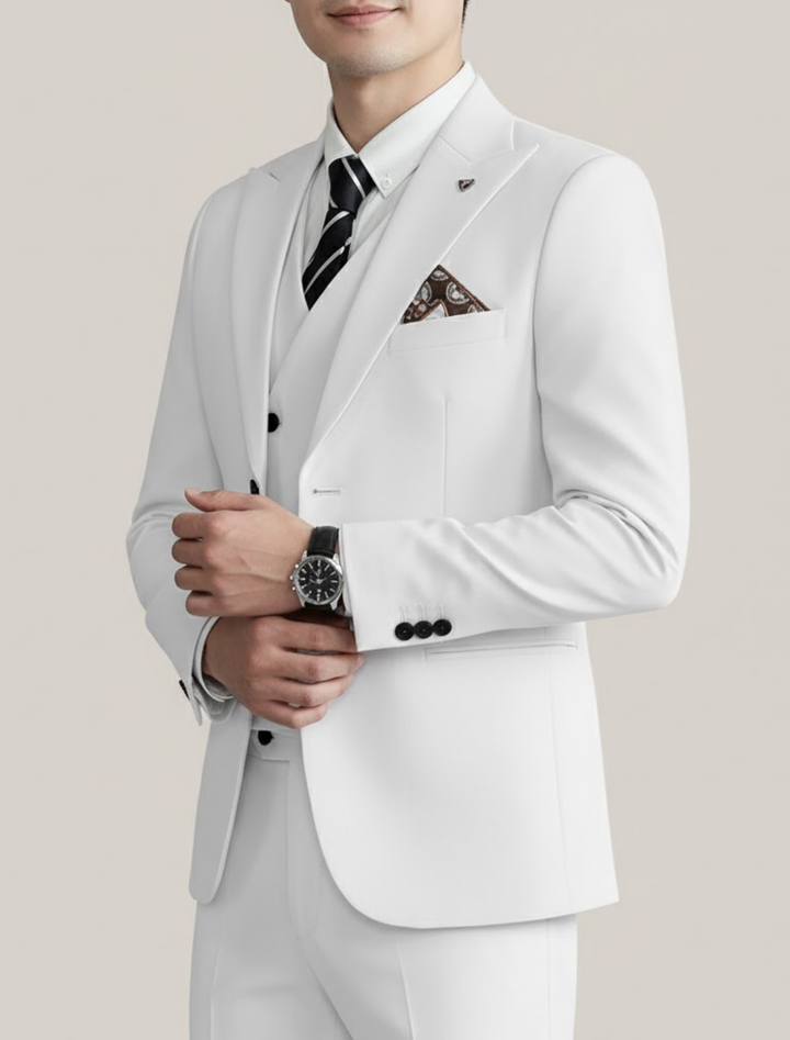 Gentleman in a stylish three-piece suit, highlighting the elegant vest, ideal for wedding or special occasion.