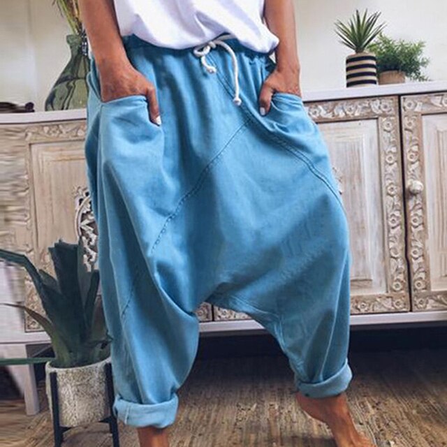 Fashionable men's bohemian harem pants with a relaxed, loose fit. Trendy and comfortable trousers for menswear.