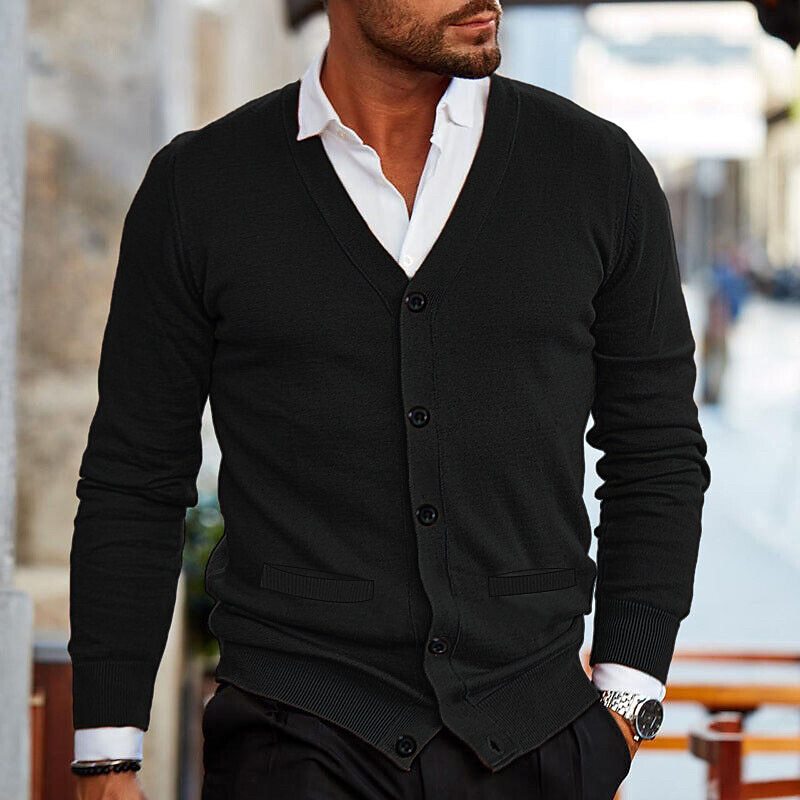 Detail shot of a men's V-neck button cardigan showing knit texture and front buttons for a versatile smart layer.