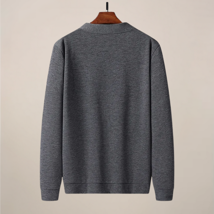 Comfortable men's V-neck knit cardigan. Versatile button-up for effortless style; ideal for all-season layering.