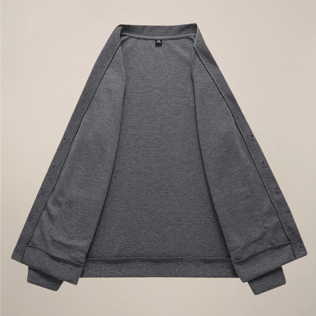 Soft knit men's V-neck cardigan featuring a button-up front & front pockets for classic, relaxed style.