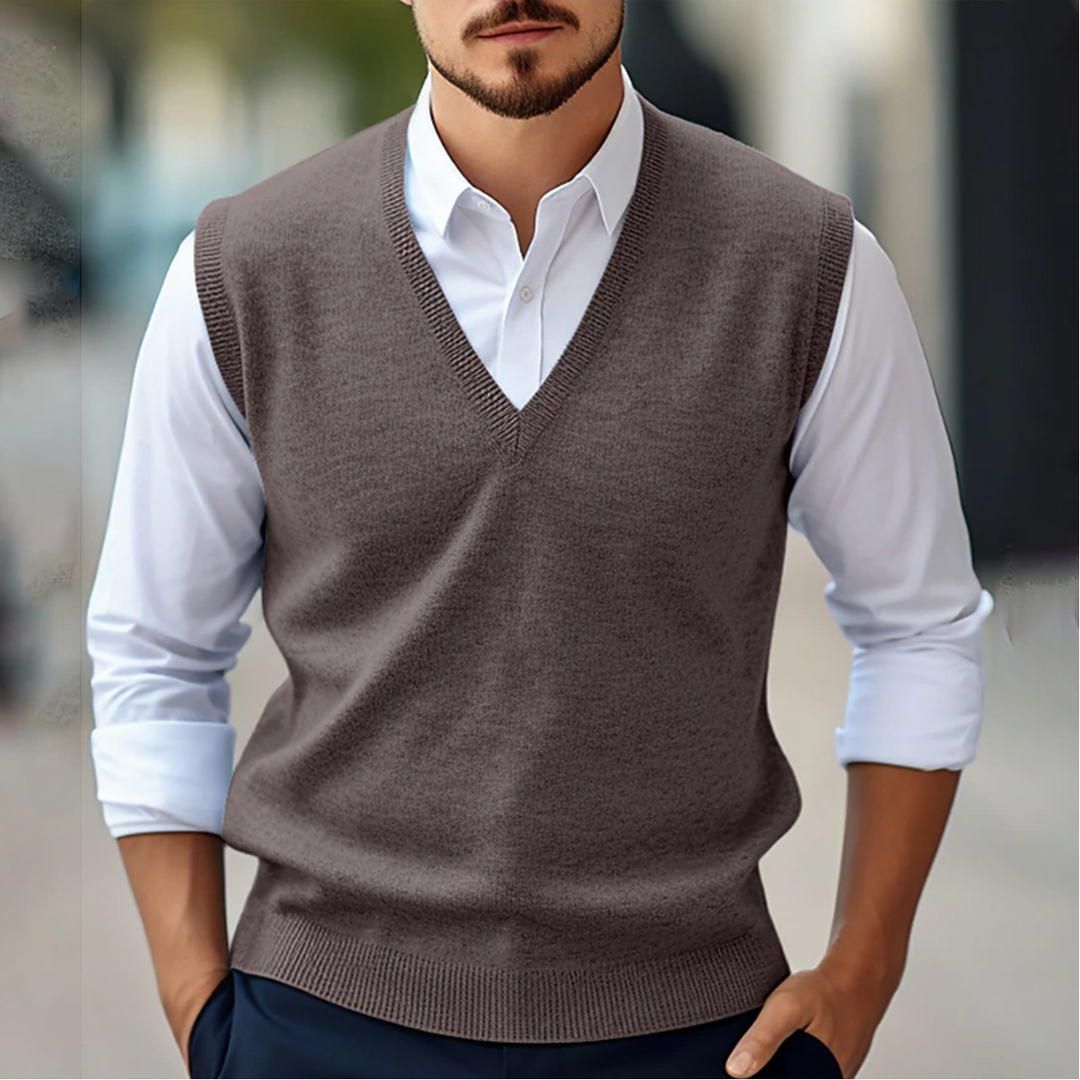 Distinguished men's V-neck sleeveless sweater vest for a sharp smart casual or business look. Essential office wear.
