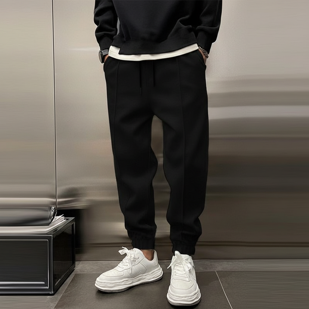 Breathable men's casual pants with elastic waist, offering ultimate comfort for everyday and light activities.
