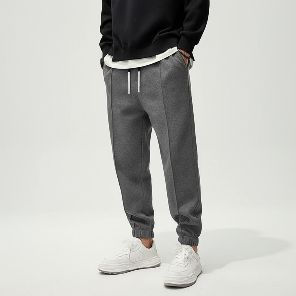 Men's versatile active pants, elastic waist, suitable for gym, running, or relaxed casual styling.