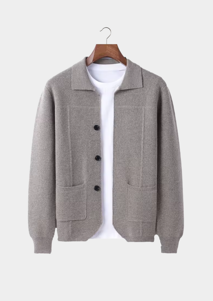Men's button-up cardigan with a collar & front pockets. Stylish knitwear, great for casual or business casual looks.
