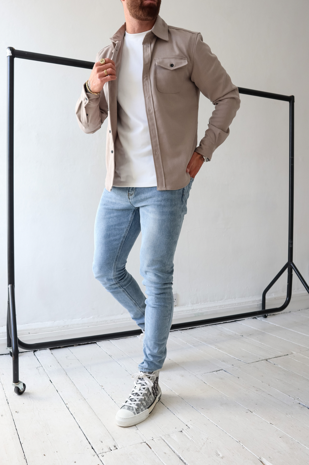 Stylish men's shacket, perfect for layering; a transitional button-up long sleeve overshirt jacket.