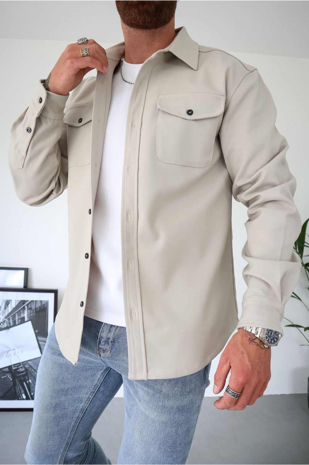 Men's button-up overshirt jacket, a versatile shacket with chest pockets for casual layering.