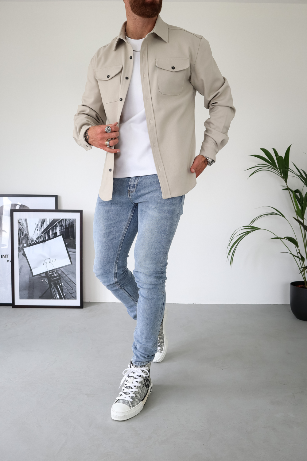 Everyday men's fashion: a versatile button-up overshirt jacket with pockets, perfect for casual outings.