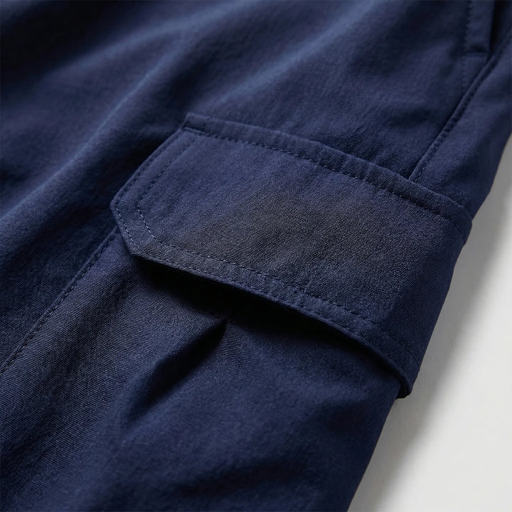 Durable men's cargo shorts with practical side pockets, excellent for casual wear & outdoor exploration.
