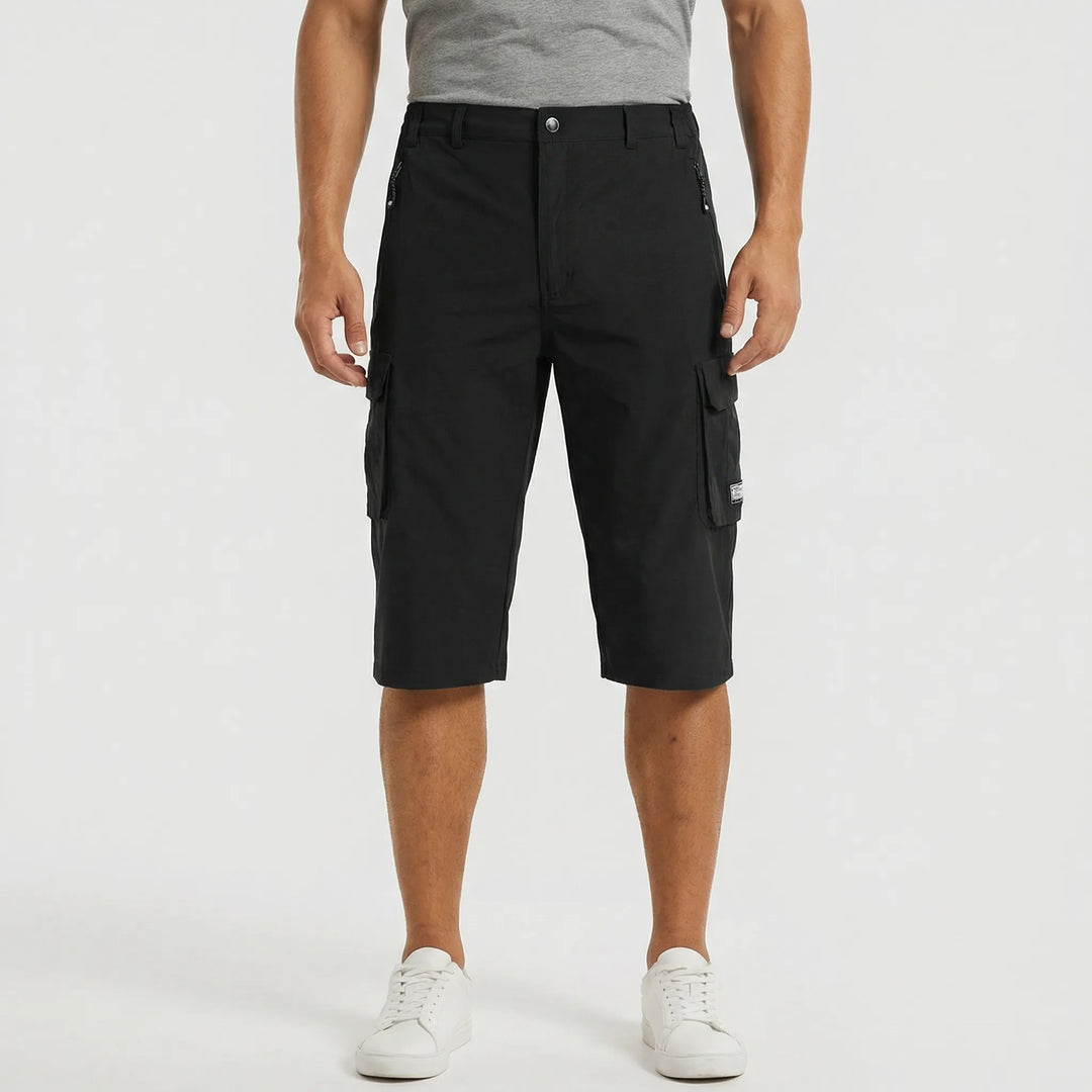 Relaxed fit men's cargo shorts, versatile for outdoor activities, casual wear & athletic summer comfort.