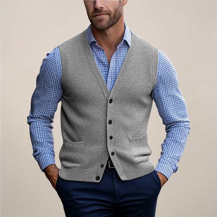 Versatile men's sleeveless knit vest sweater, a wardrobe staple for modern layered fashion and comfort.