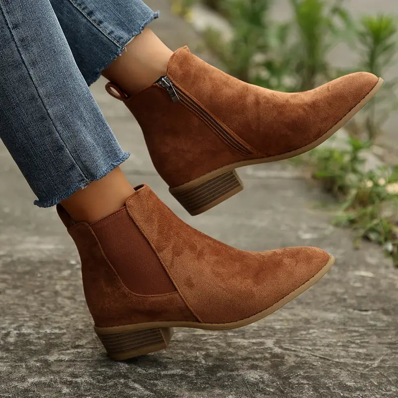 Men's versatile pull-on Chelsea boots in dark brown leather, perfect for casual or formal wear, with elastic side panels.