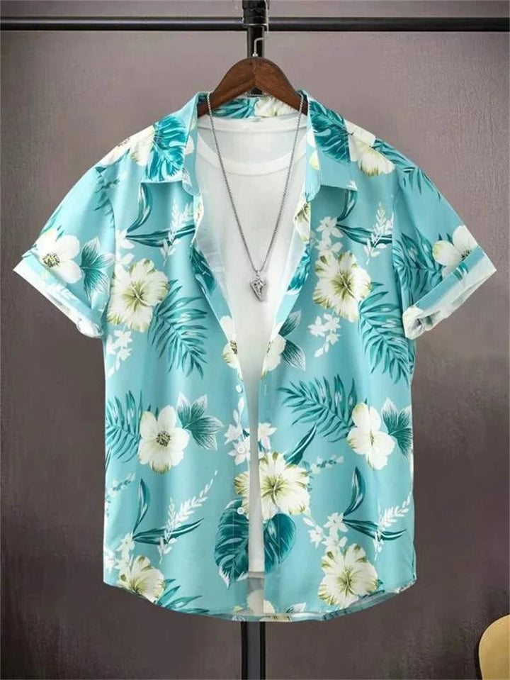 Vibrant floral print men's short-sleeve collared shirt, perfect for beach or casual outings.