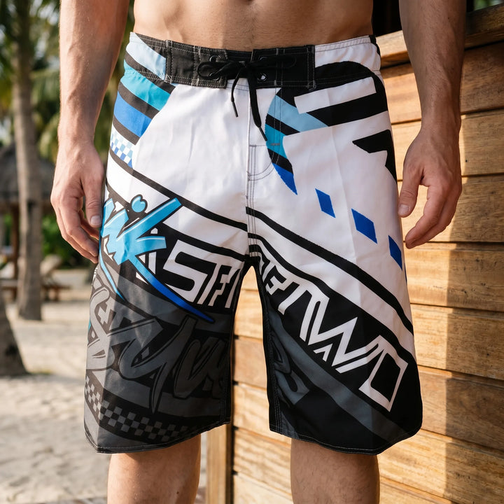 Men's vibrant quick-dry printed swim shorts, perfect for beachwear & summer vacation.
