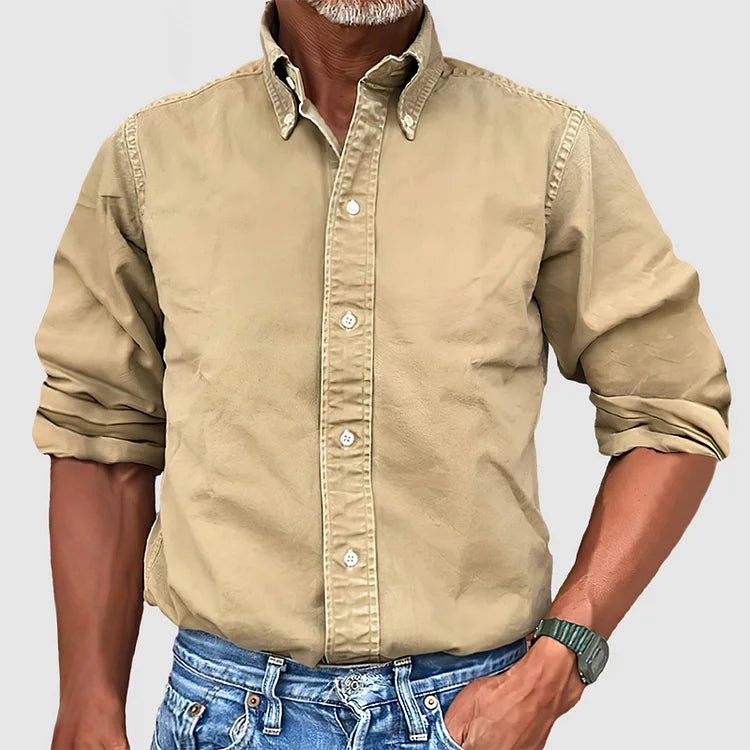Stylish men's vintage wash button down. Relaxed fit collared shirt, ideal for business casual.
