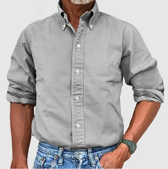 Men's collared button down shirt in vintage wash. Relaxed fit, long sleeve, perfect for casual & business.