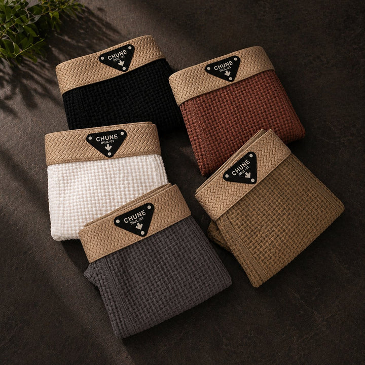 Men's waffle knit boxer loungewear, a daily essential. Enjoy relaxed fit comfort for sleep or lounging.