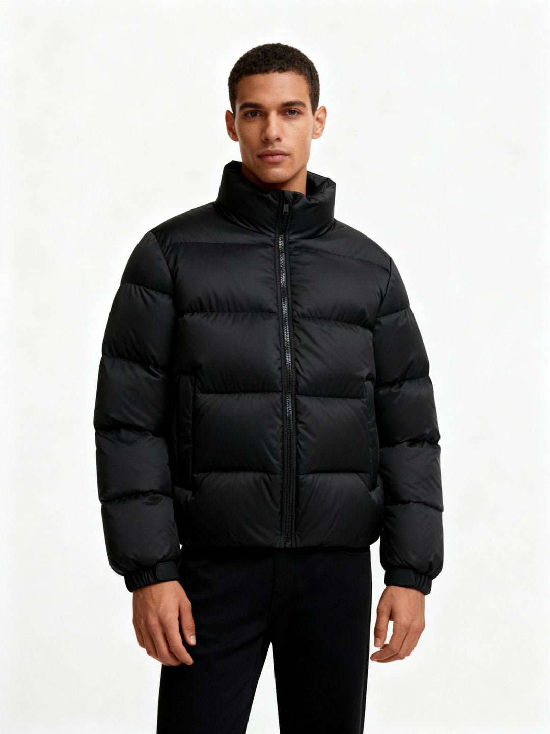 Trendy men's warm jacket with hood, lightweight yet highly insulated for everyday winter fashion.