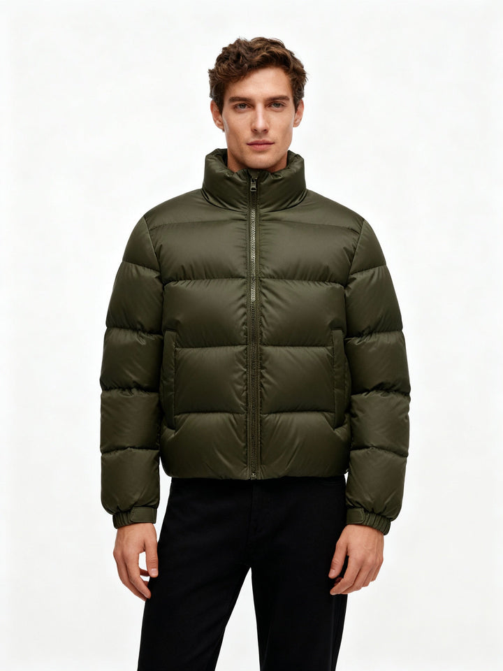 Comfortable men's puffer jacket with a snug hood, offering premium insulation for outdoor adventures.