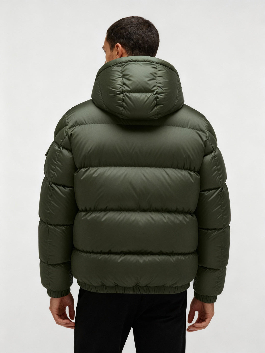 Fashionable men's winter coat, a warm puffer jacket with hood for comfort and style in cold weather.