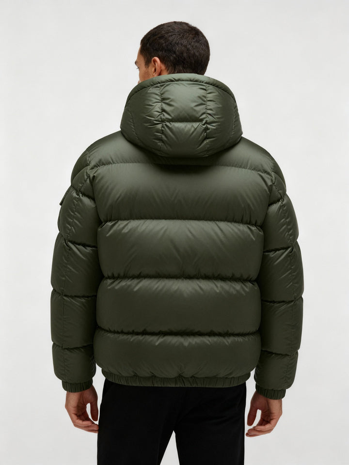 Fashionable men's winter coat, a warm puffer jacket with hood for comfort and style in cold weather.