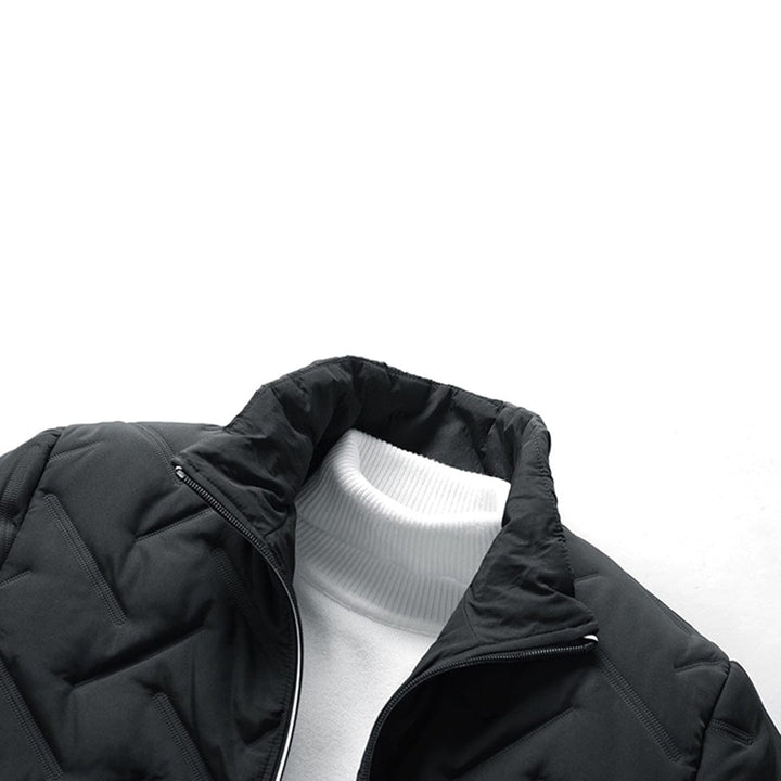 Modern men's quilted bomber jacket, providing warmth & style for fall and winter. A fashionable outerwear choice.