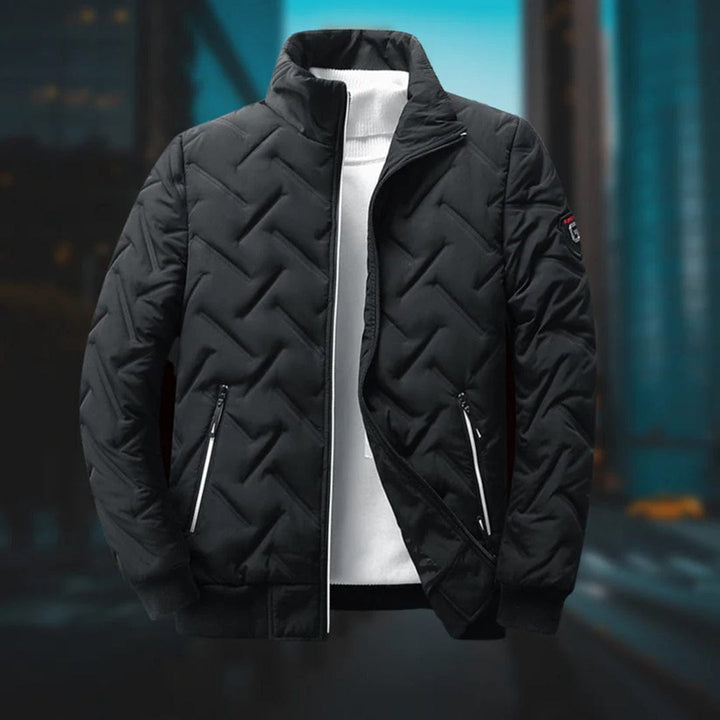 High-quality men's quilted bomber jacket, offering superior warmth & style for fall and winter outerwear needs.