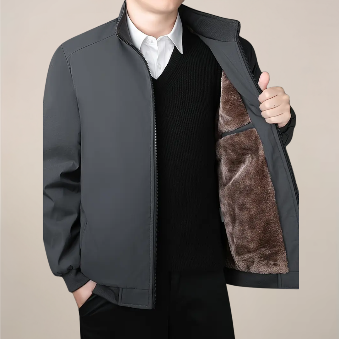 Cozy men's winter jacket, full zip for warmth. Essential outerwear for cold weather layering.