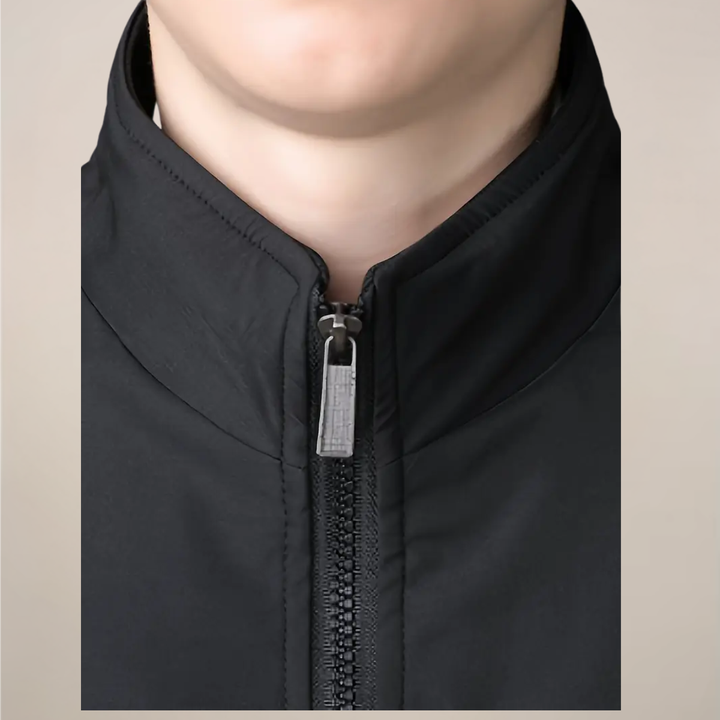 Classic men's warm zip-up jacket. Stand collar design offers comfort & style for winter.