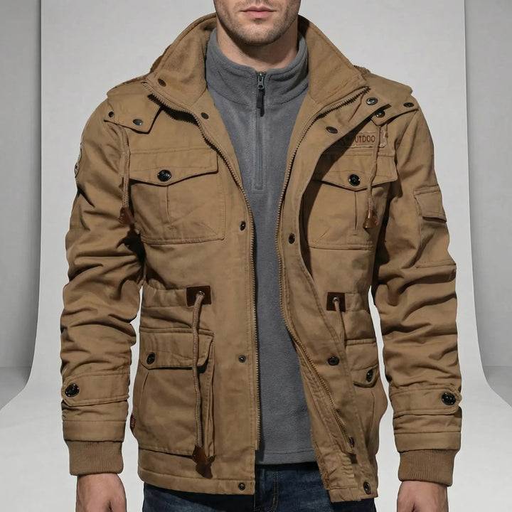 Stylish men's urban parka in dark color, featuring water-repellent fabric for everyday fall/winter wear.