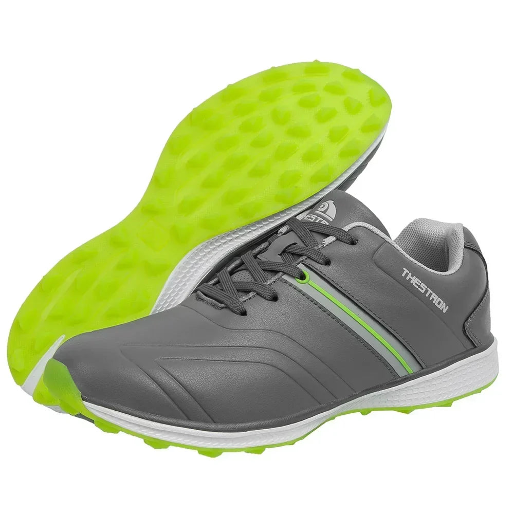 Durable men's waterproof golf shoes with long-lasting fixed spike traction, ensuring stability for every golf swing.