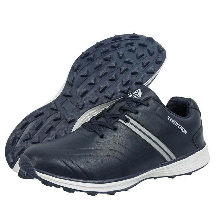 Premium men's waterproof golf footwear with fixed spikes, offering exceptional grip for challenging course conditions.